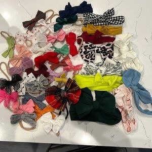 Lot of 40+ bows. Most worn 0-2 times. Like new condition.